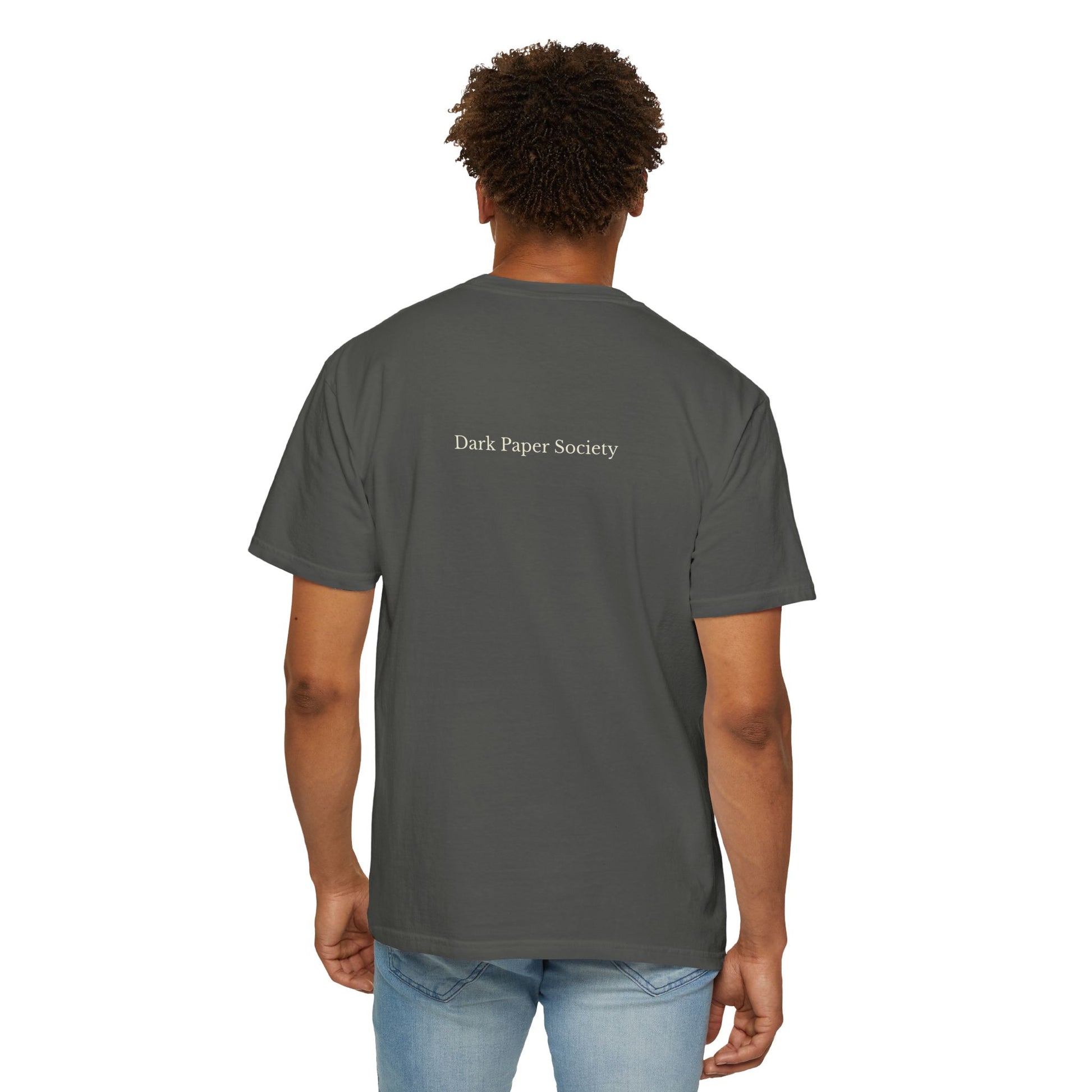 Person wearing a gray t-shirt with 'Dark Paper Society' text on the back, standing against a white background