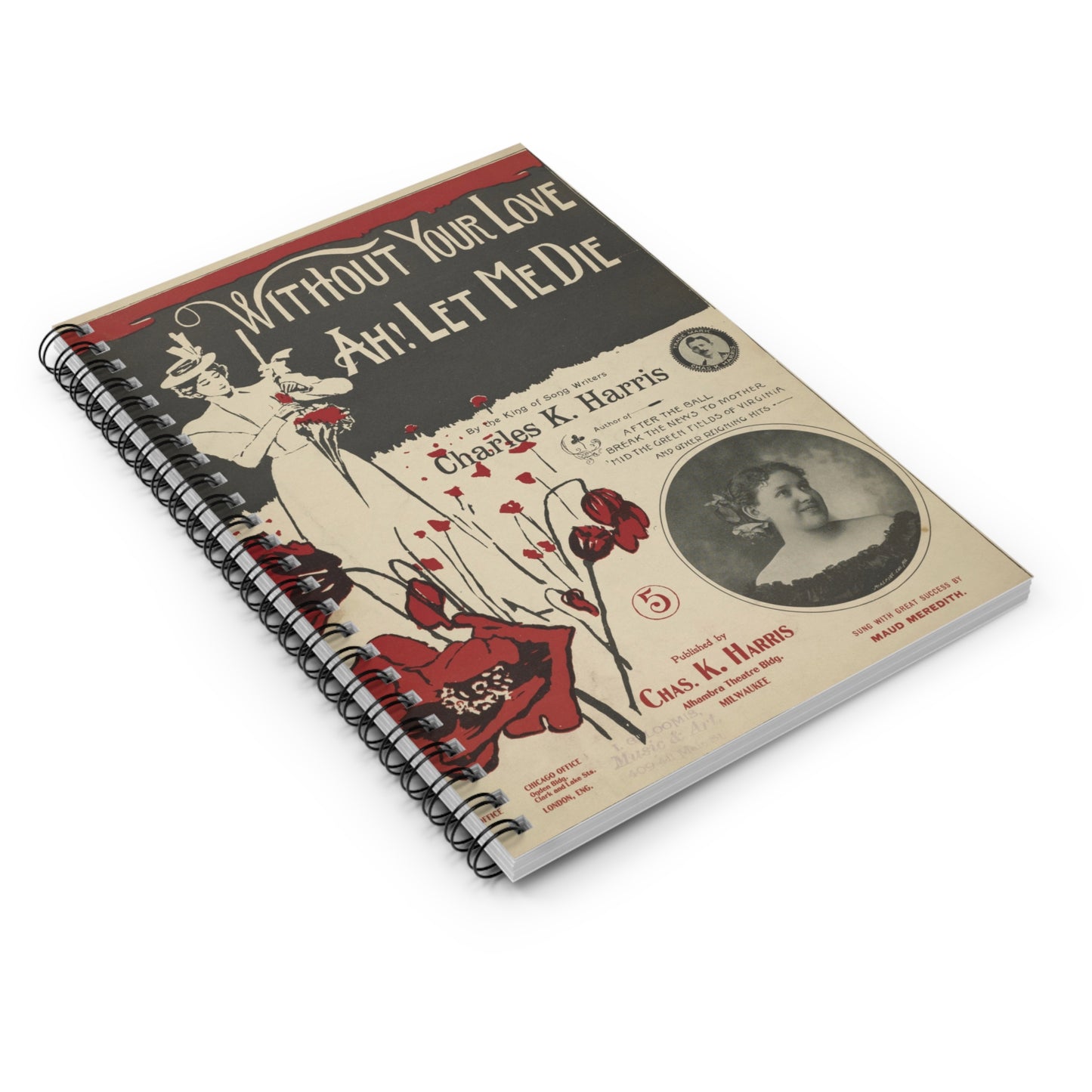Notebook with vintage-style cover featuring text and images on a white background