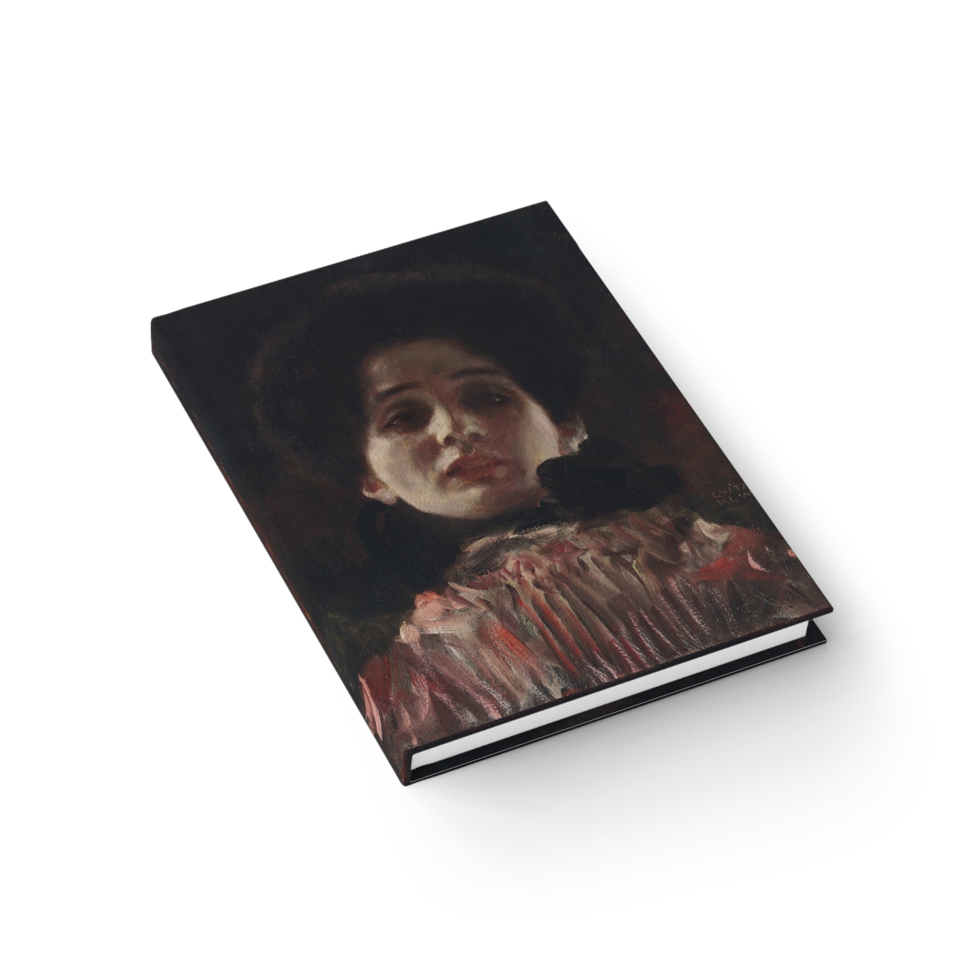Notebook with a painting of a woman's face on the cover, on a white background