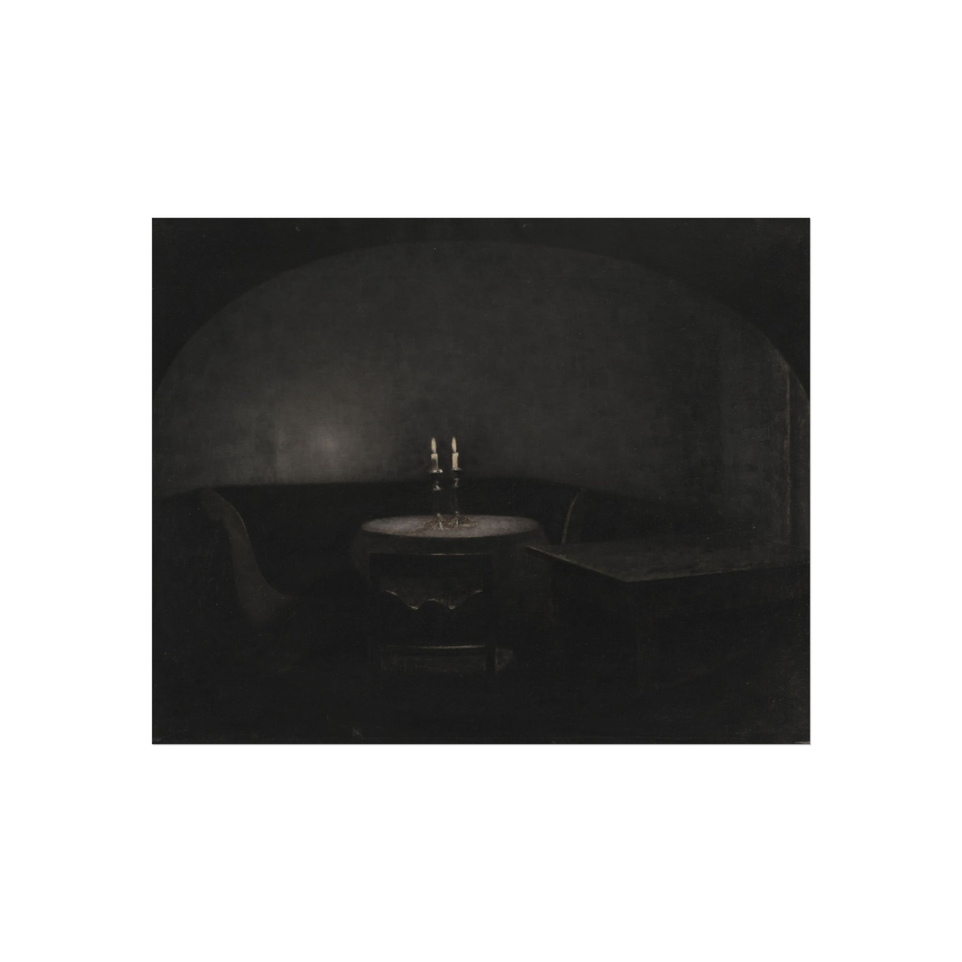 Dark room with a table and chair, illuminated by a single light source.