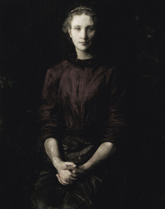 Dark portrait of a woman wearing a dark dress against a black background