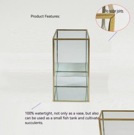 Glass vase with gold frame on a white background, highlighting no solder joints.