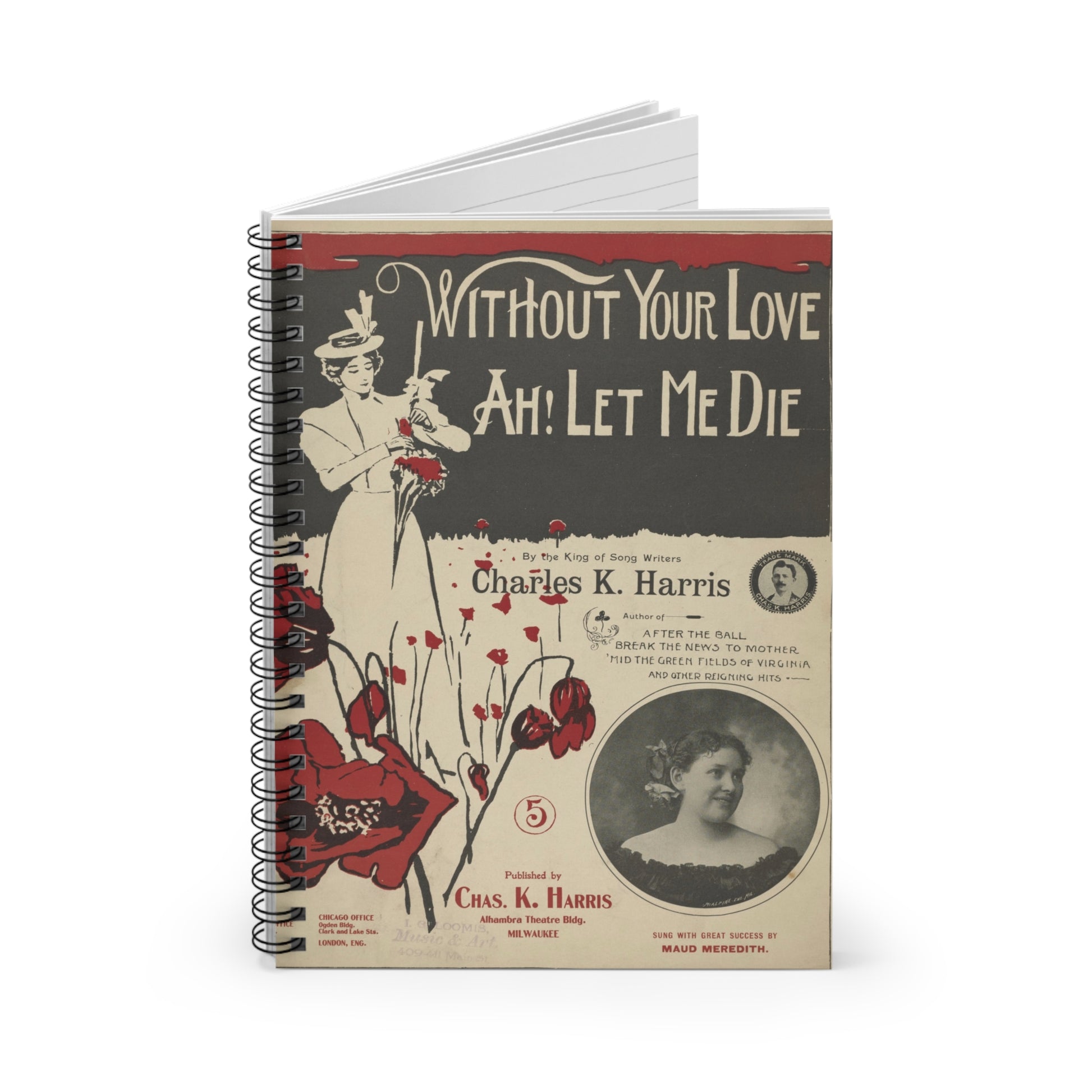 Notebook with vintage design featuring a woman, flowers, and text on the cover.