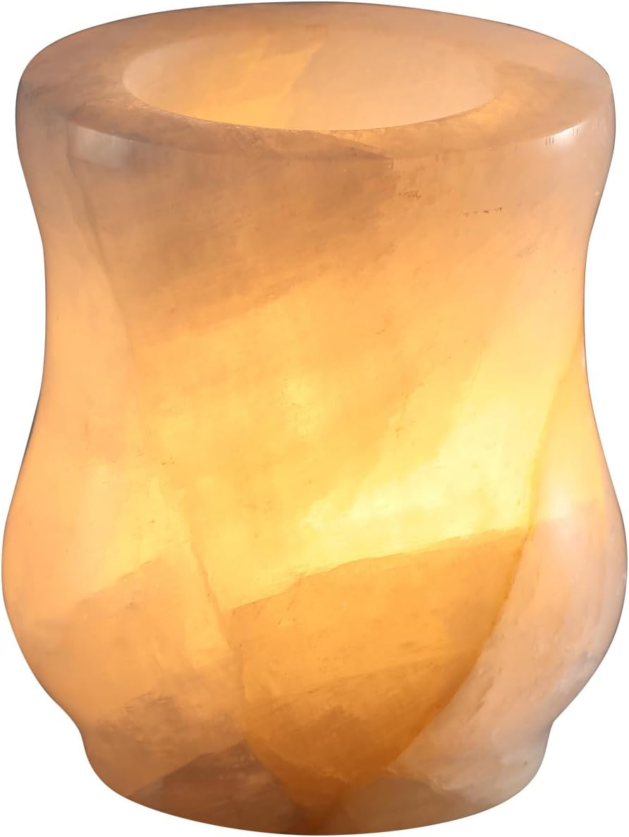 Decorative lamp with a warm glow on a white background